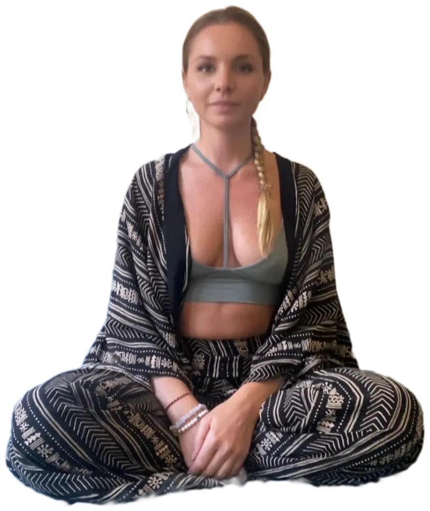 Vasilisa Kalinina, seated cross-legged in a patterned robe